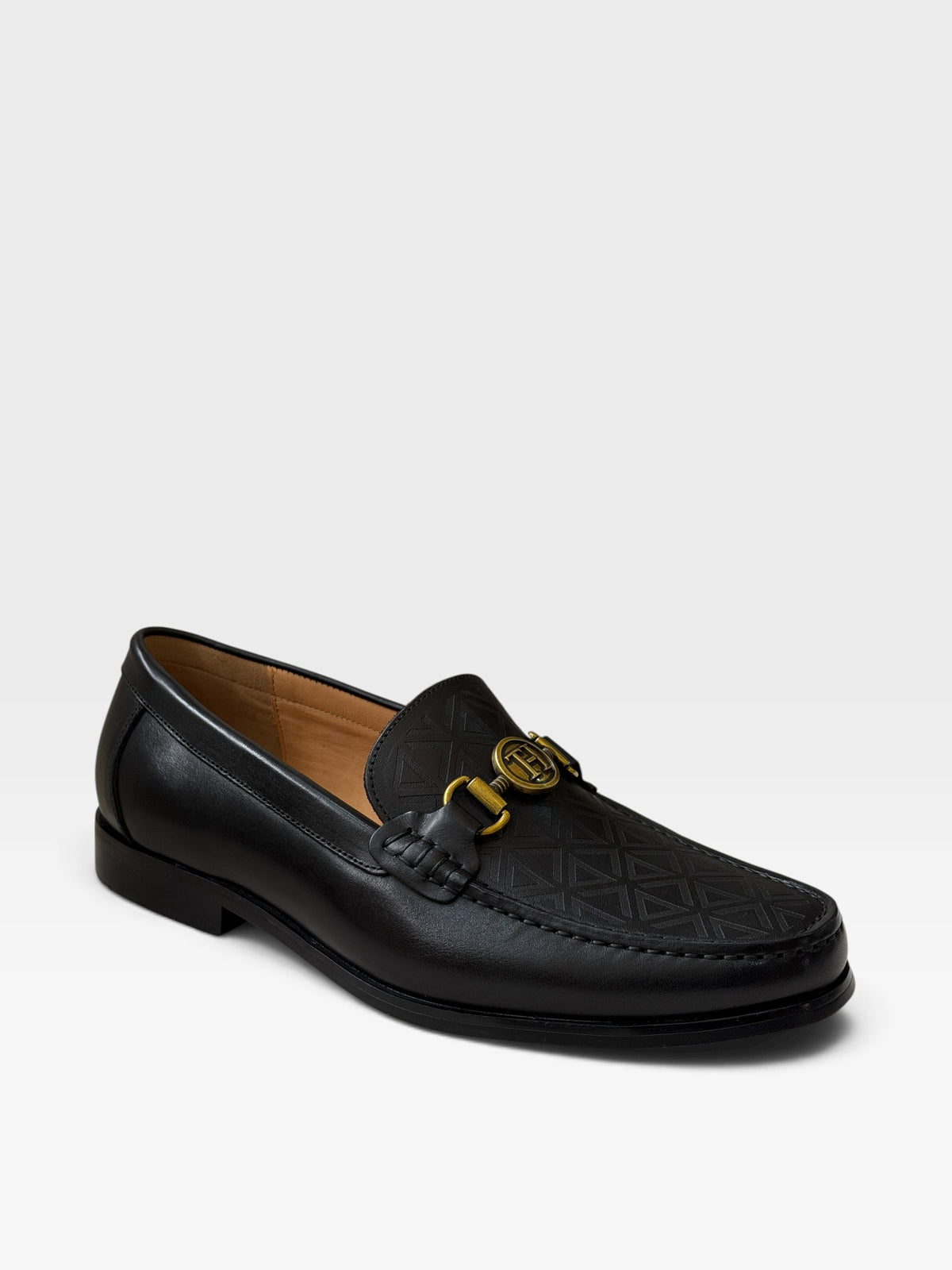 Angled view of Tishil Aurel Noir luxury black loafer